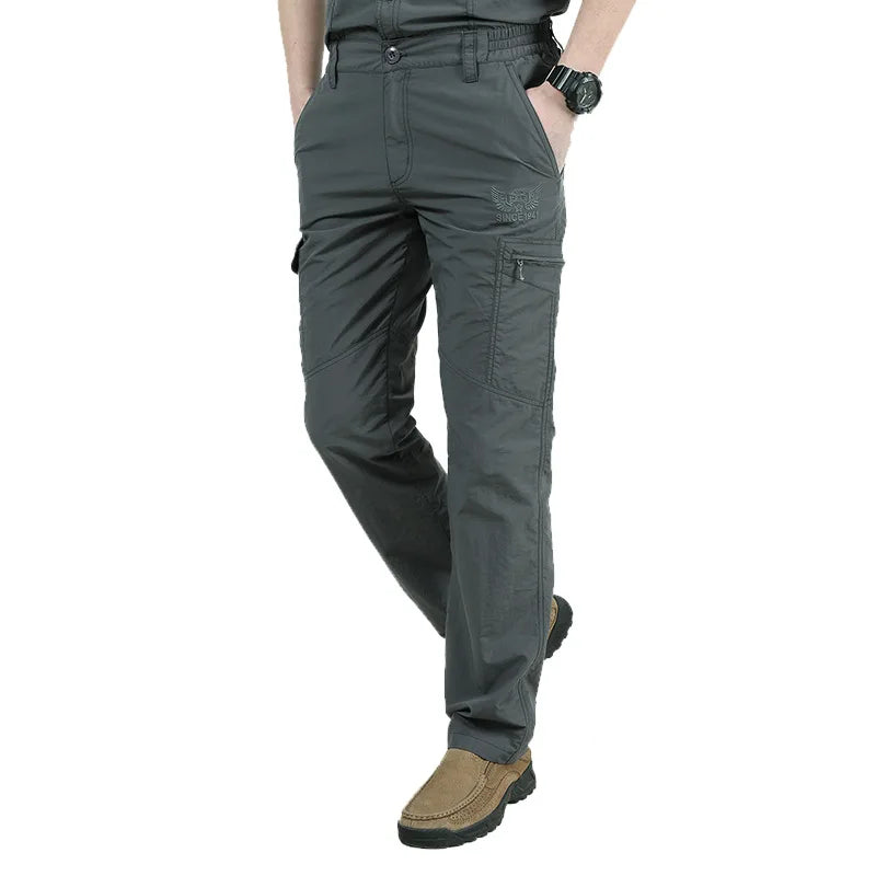 Calças de carga respirável impermeáveis masculinas, calças compridas masculinas, corredores de bolsos do exército, casual, verão, plus size, 4XL