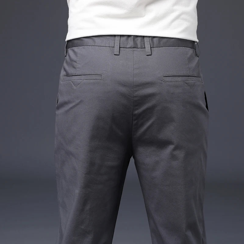 Calças masculinas de algodão casual estiramento calças masculinas homem longo em linha reta alta qualidade 4 cores plus size calça terno 42 44 46