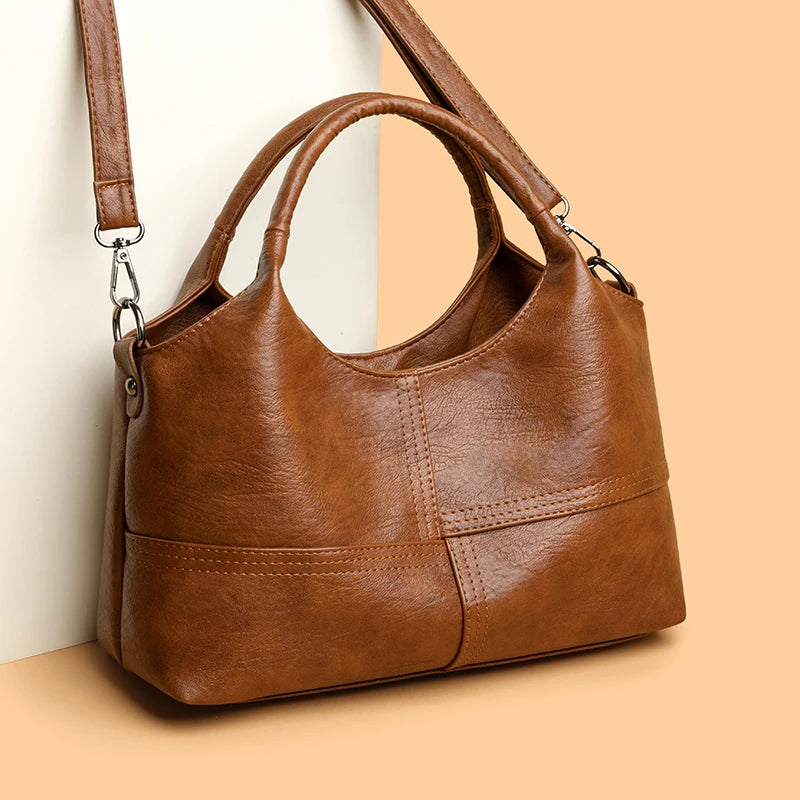 Bolsa, bolsa feminina, 2025 nova bolsa de couro macio moderna e simples, bolsa mãe de meia-idade, versátil de ombro único cr