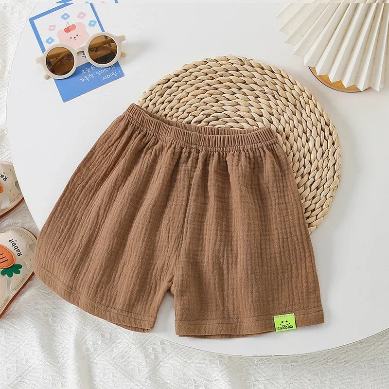 Moda algodão cor sólida crianças shorts infantil estilo coreano verão praia calças curtas inferior para crianças roupas meninas meninos 4-12y