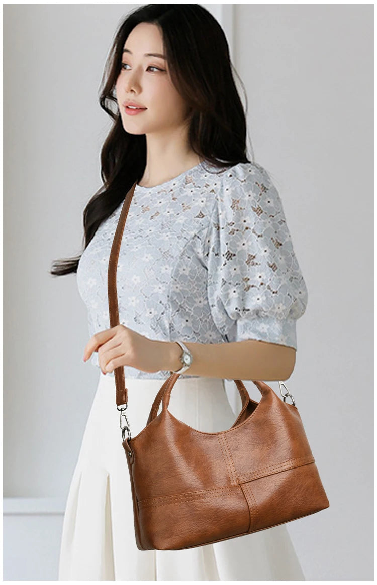 Bolsa, bolsa feminina, 2025 nova bolsa de couro macio moderna e simples, bolsa mãe de meia-idade, versátil de ombro único cr