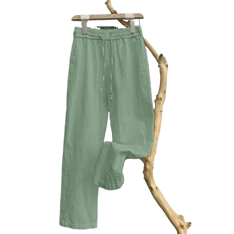 Linho natural pele pura respirável verão cor pura moda linho fino ajuste masculino solto linho reto calças casuais
