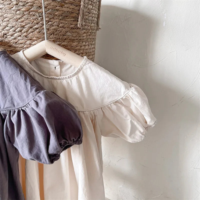 Vestidos de Algodão para Meninas Bebê Estilo Coreano Verão 2026 com Mangas Bufantes em Cores Sólidas