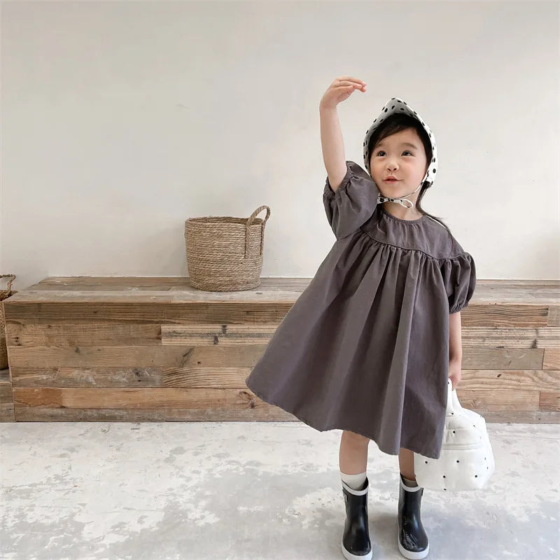 Vestidos de Algodão para Meninas Bebê Estilo Coreano Verão 2026 com Mangas Bufantes em Cores Sólidas